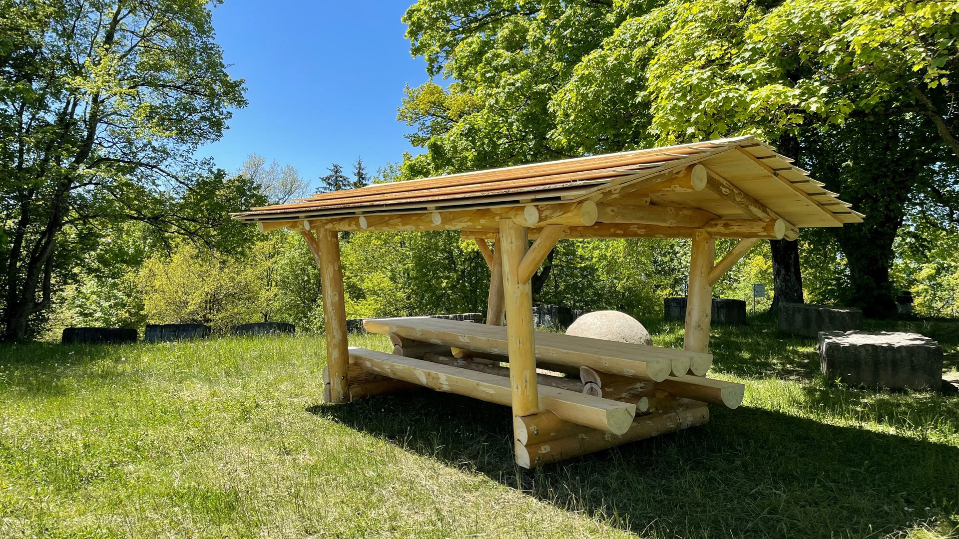 Outdoor wooden seminar table in the park