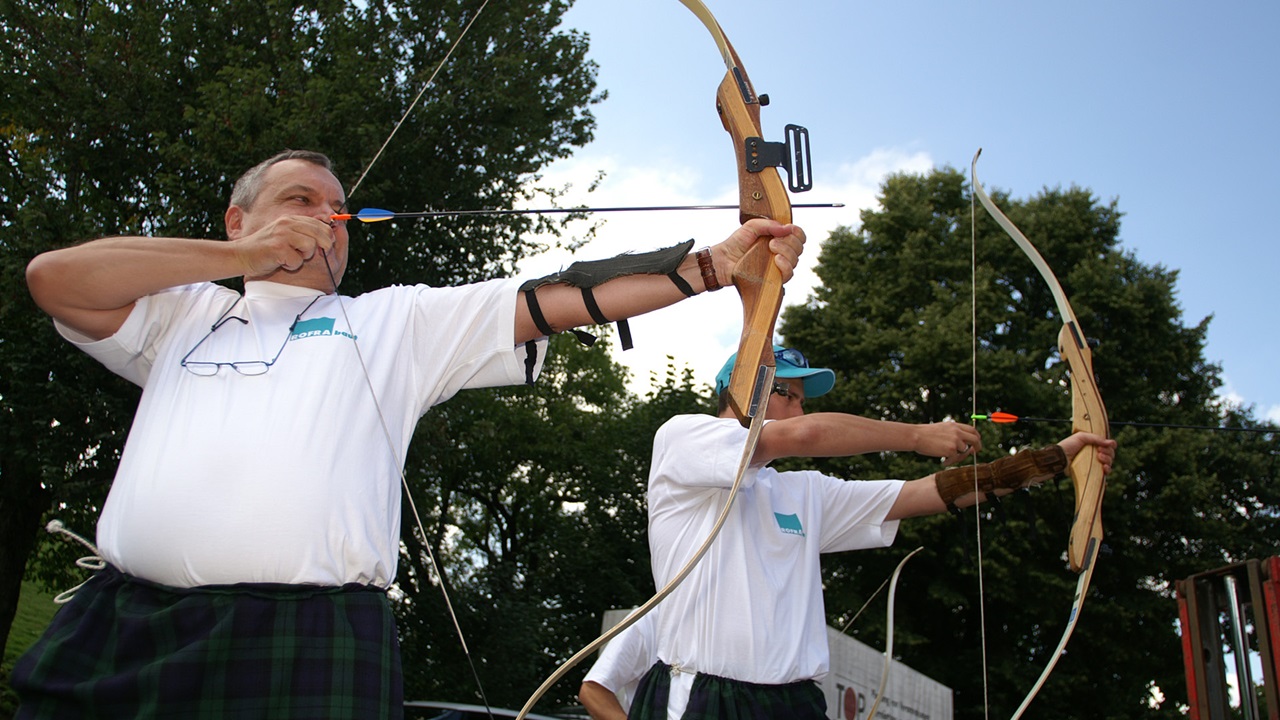 Two men doing archery at the Gurten Games