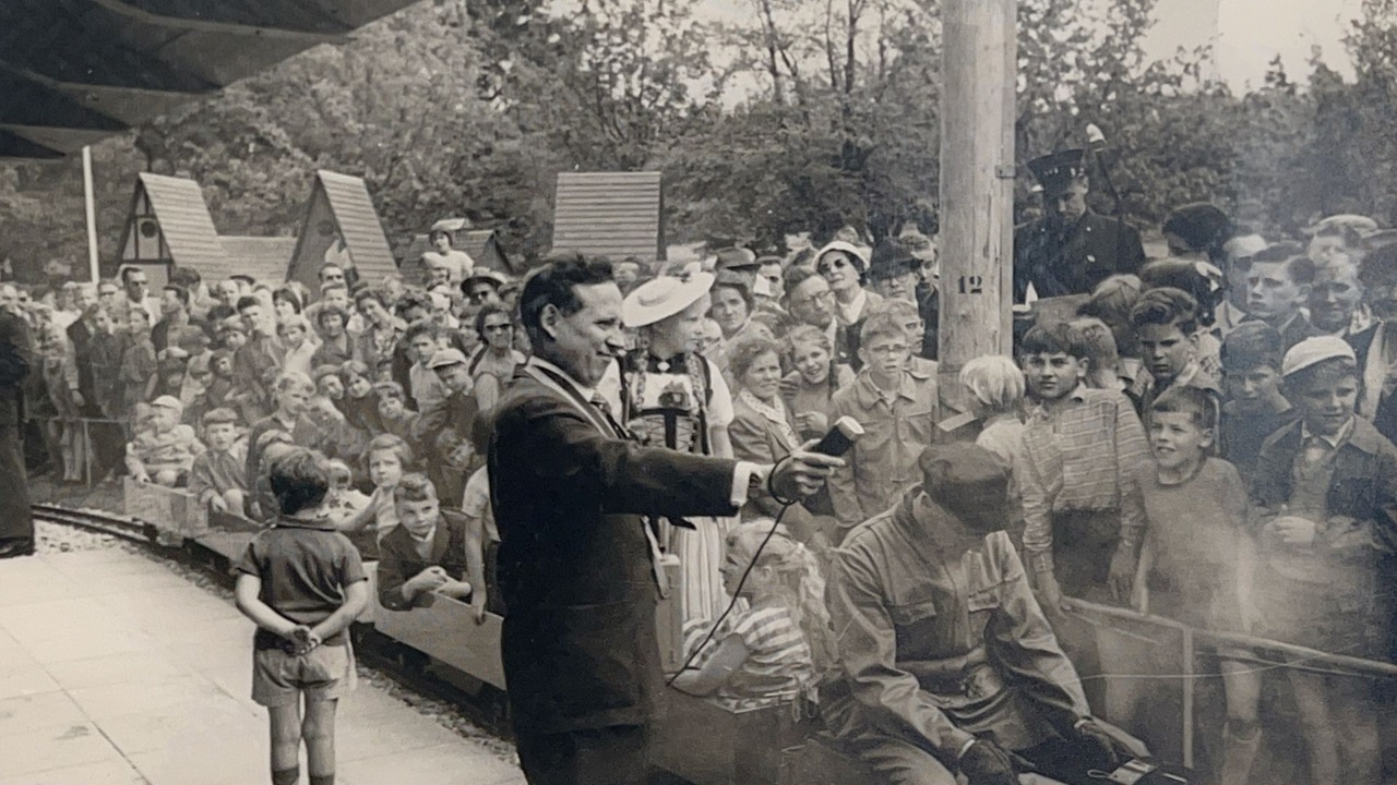    A man gives a speech about the railroad.