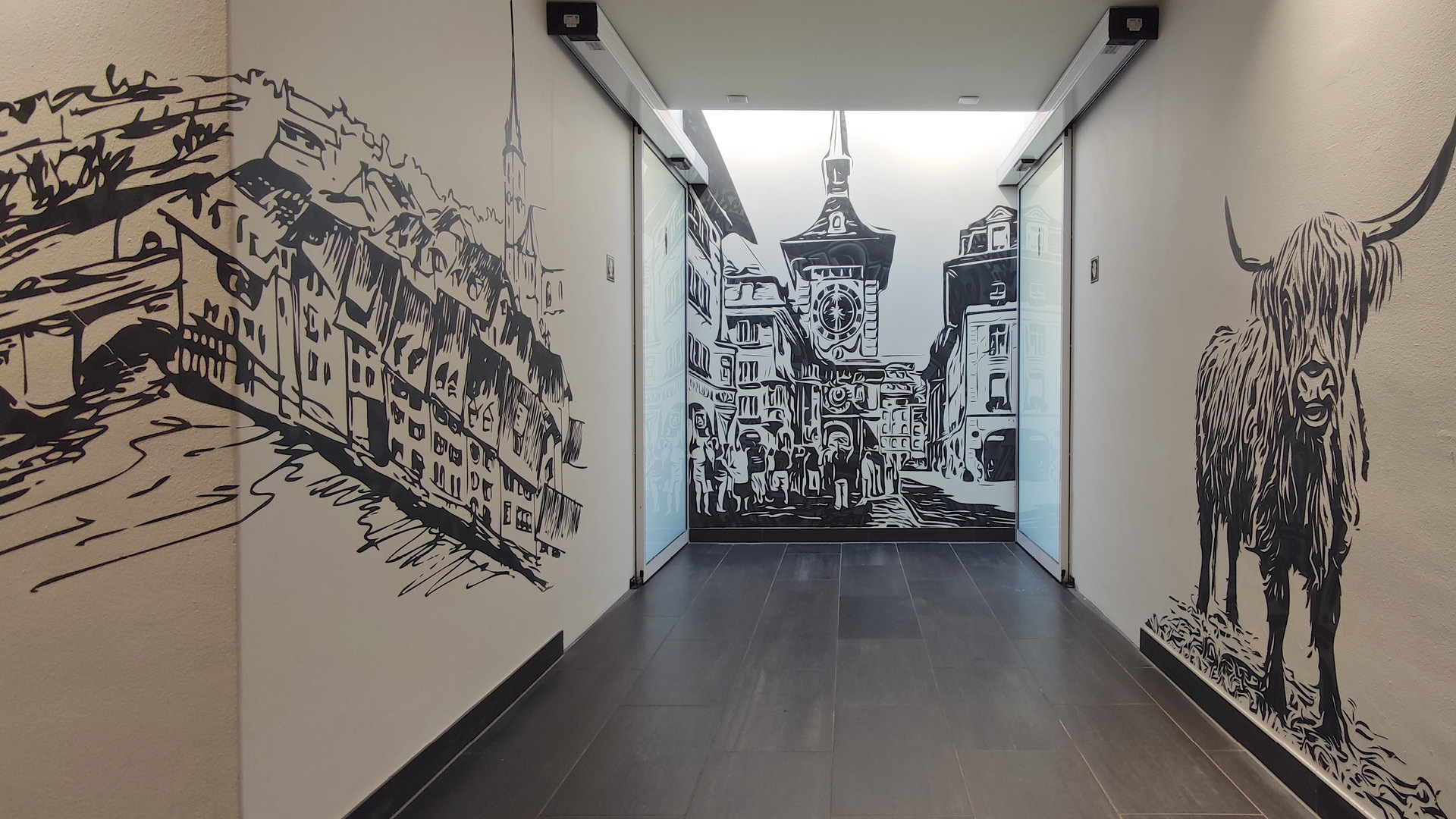 Graffiti decorates the corridor. It was created by local designers. 