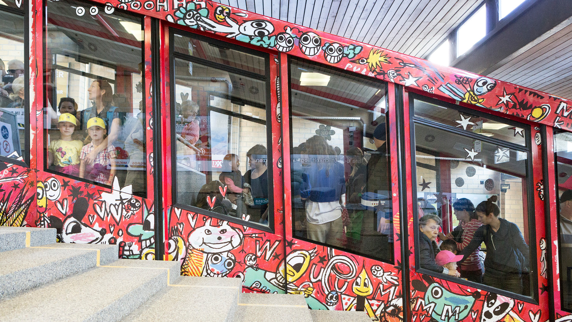 Different comic illustrations on the funicular designed by M.S. Bastian.