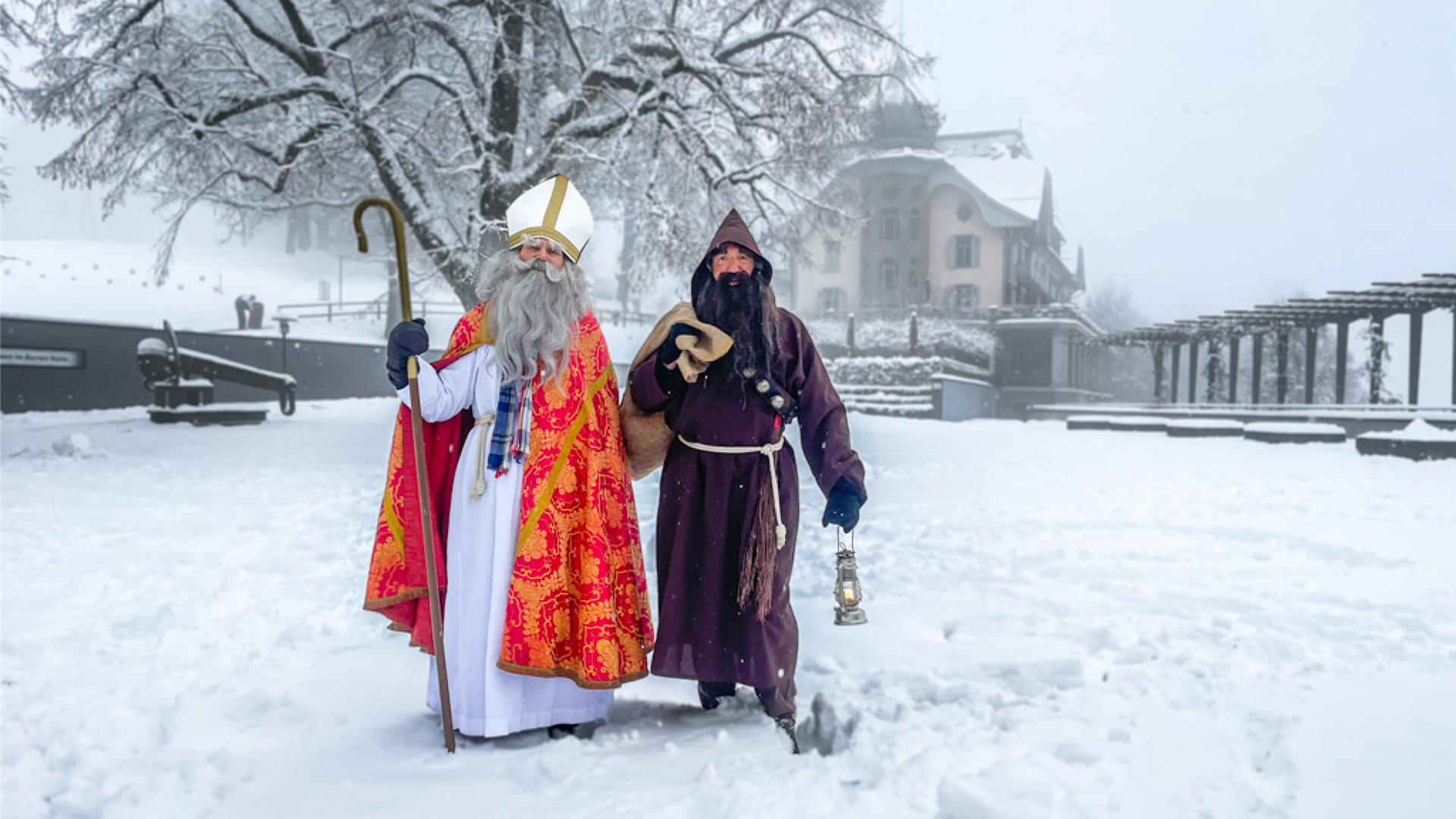 Saint Nicholas and Schmutzli in front of the Kulm building