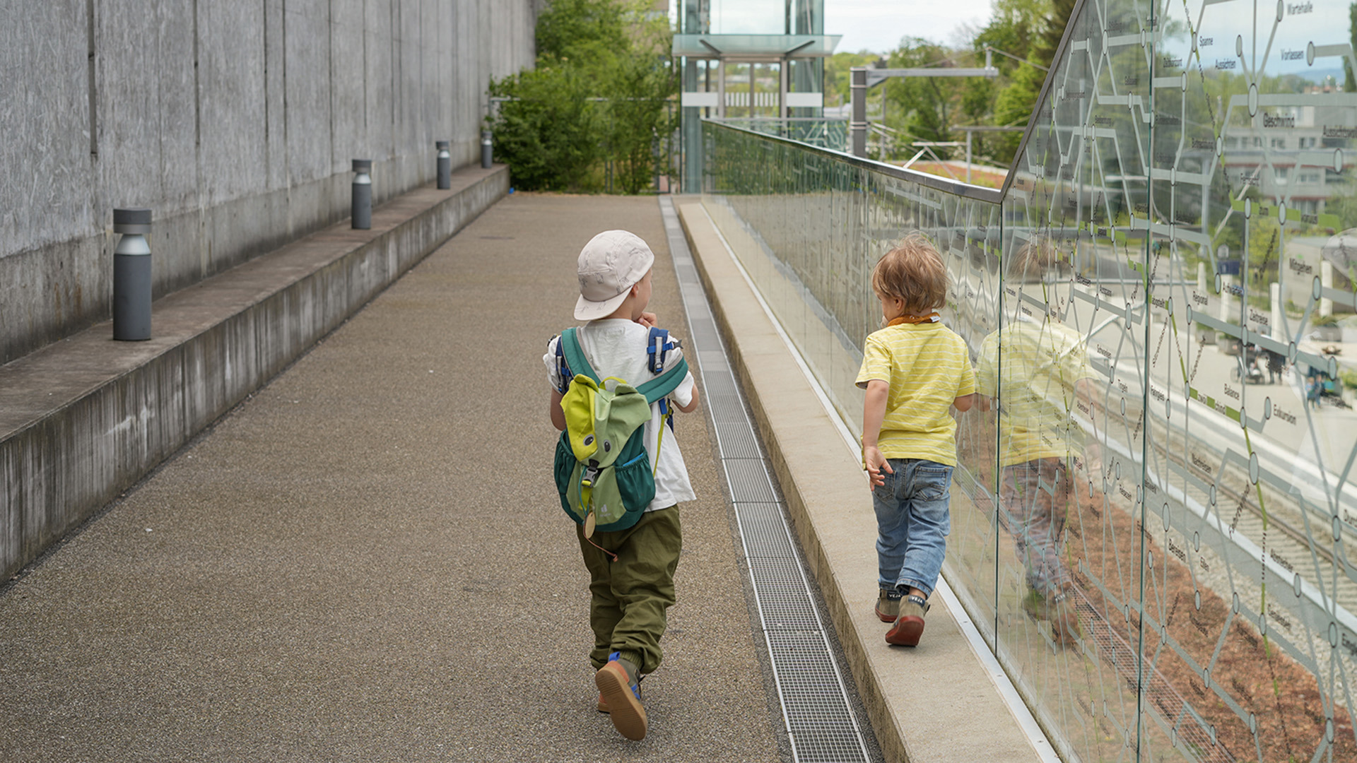 Two little boys at the train station in Wabern.