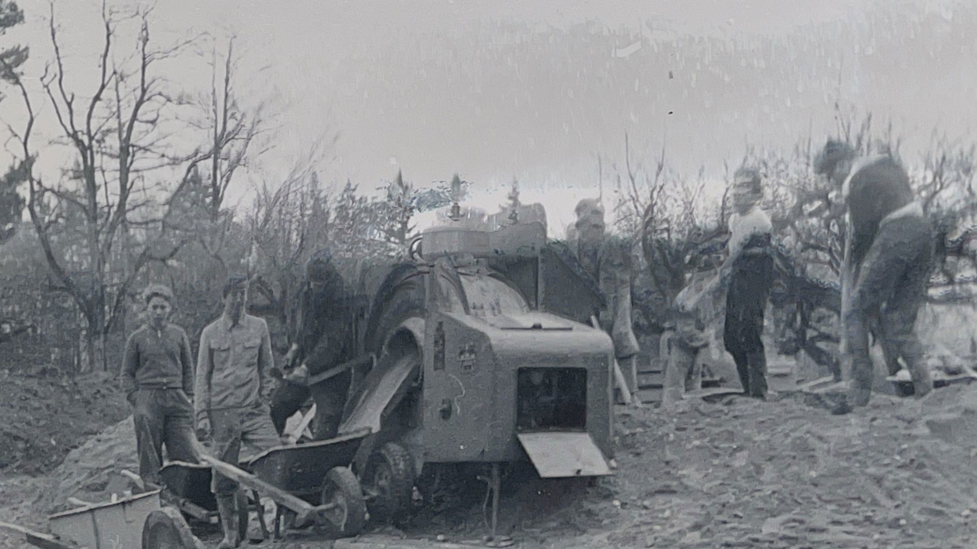 The boys and men refine the earth.